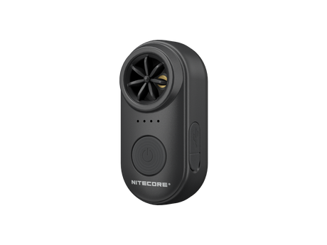 A compact handheld electronic whistle in black, featuring a circular fan grille, four indicator lights, a large power button, and a USB-C port on a plain white background.