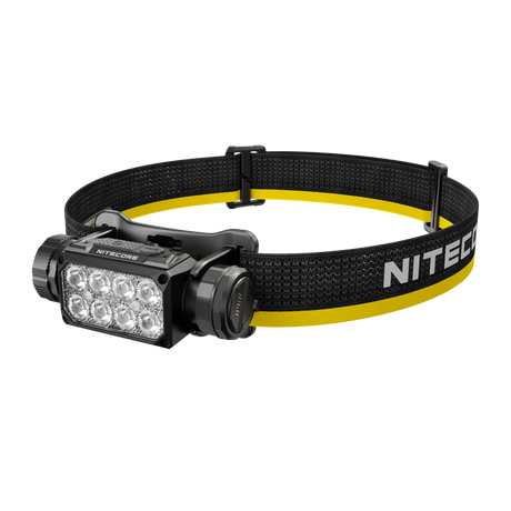 Nitecore HC65 MCT headlamp with a black adjustable elastic strap featuring a yellow stripe and white NITECORE branding.