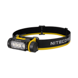 Nitecore headlamp with a black and yellow adjustable headband, featuring a black and yellow housing with four clear LED lenses, shown on a solid white background.